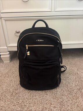 Tumi Black Nylon Backpack with Gold Hardware Accents